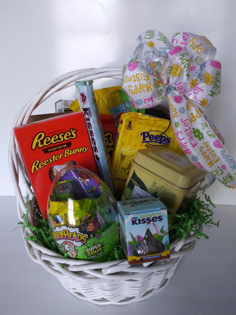A Happy Easter gift basket filled with chocolate Easter Bunny and candies for Boston MA. delivery.