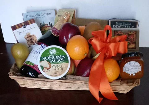 Fruit gift basket in Boston for sympathy and thank you gifts, basket contains pretzels, fruit jam, gourmet cookies, and snack
