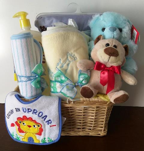 A baby gift basket with a personalized baby blanket, hooded towel, and baby bath accessories for a boy or baby girl. In Boston, Massachusetts.
