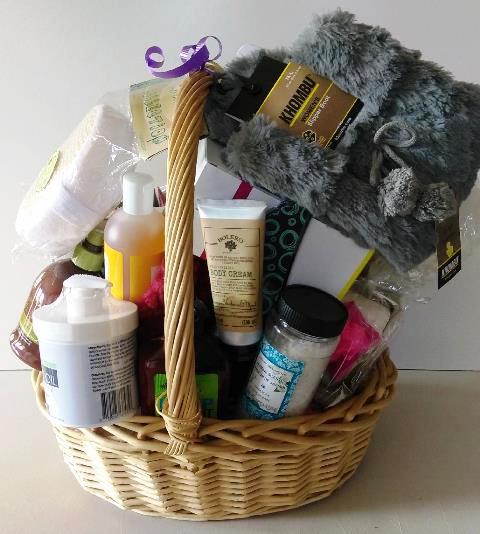 A bath and body gift basket filled with luxurious body essentials for her is available in Boston, Massachusetts at KJ Paula Gift.