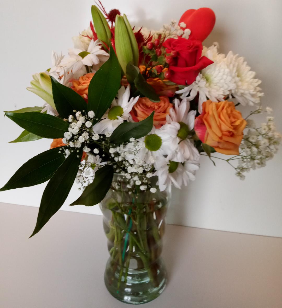 Flower bouquet arrangement delivery to the Boston Logan Air Port hotels and East Boston, Massachusetts, neighborhood.
