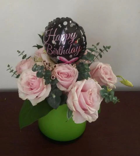 Birthday flower bouquet, A beautiful rose arrangement with a birthday balloon attached, for a happy birthday wish in Boston