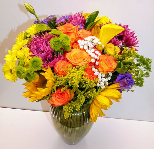 A beautiful flower arrangement for special occasion. Mother's Day flower, birthday and thank you flowers for delivery in Boston, MA. Available at KJ Paula Gift Baskets 02119 and phone number to call 617-990-7814