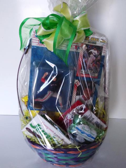 Boy Easter gift basket filled with, Easter chocolate, Easter candies, and a "Sport figures" collection" in basket. Available in Boston for delivery