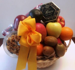 A fruits and nuts gift basket is ideal for showing condolences. Available in Boston, MA., Kiwi fruits, avocado and cheese