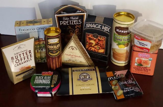 A collection of gourmet gift item, packed into this gift ready ready for delivery within the Boston, Massachusetts. Gourmet gift baskets available at KJ Paula Gift Baskets. 617-990-7814