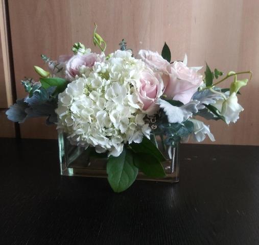 Express your condolences with fresh flowers delivered promptly in the Boston area. This thoughtful arrangement offers a meaningful way to show support during difficult times.