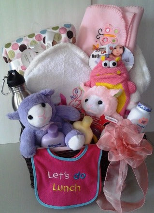 Surprise a new mother and her baby girl in Boston with a wonderful basket full of blankets, toys, bath accessories, and a water bottle for the mom.