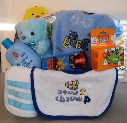 Baby boy gift basket with personalized blanket, baby bibs, teddy bear, and baby bath accessories
