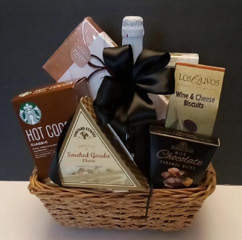 Condolence chocolate gift basket, This gift basket is packed with a box of classic hot cocoa mix, chocolate caramel bites, smoked cheese, Christmas chocolate, crackers and biscuits