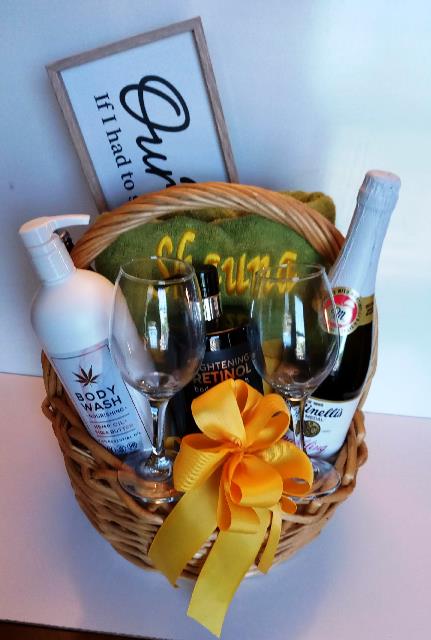 Realtor appreciation gift basket, with personalized towel, and body essential. 