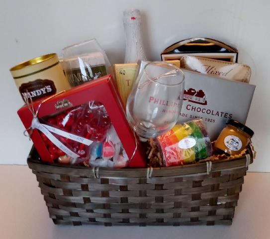 A celebrate gift basket packed with sweet treat and gourmet treat to enjoy.