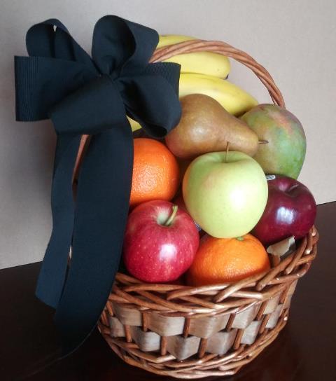 A sympathy or condolence fruit gift basket filled with fresh, hand-picked fruits. Boston, MA. Oranges, apples, fruit pears, grapes, and bananas for delivery