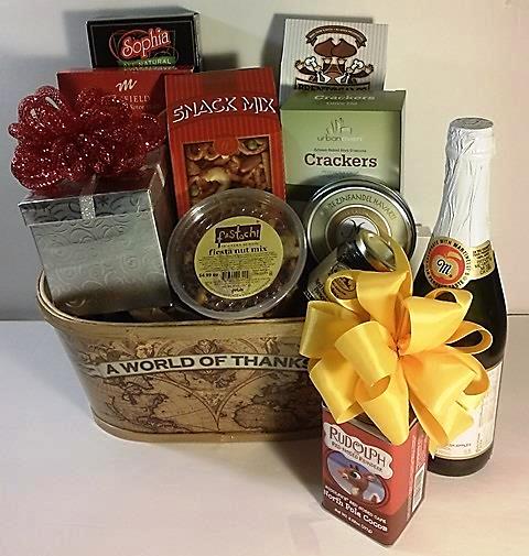 Gift a thank you gift basket this Christmas holiday season. This gift basket is overflowing with delicious Christmas hot cocoa, mix nuts, snack mix, crackers and cheese. 