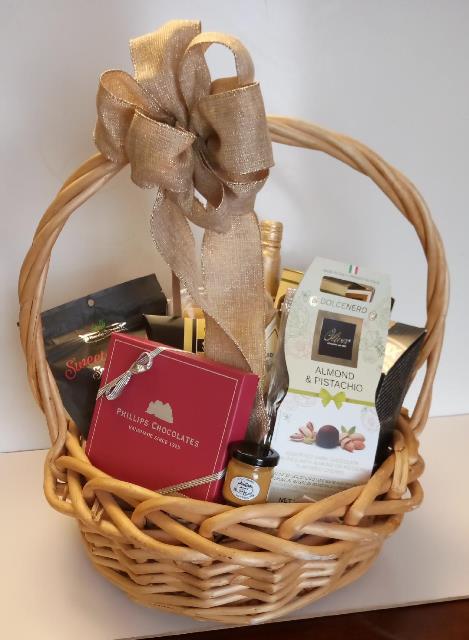 A gift basket fill with gourmet food, chocolate, and nuts for Boston delivery