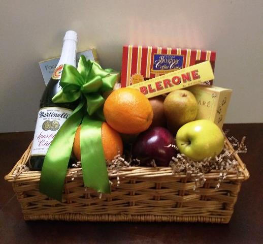 A fruit gift basket and thank you gift are available in Boston South End for delivery. The basket is packed with fruit, sweets, and chocolate.