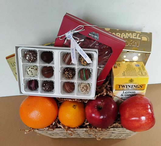 A basket filled with the best of Boston, locally made chocolates, organic lemon ginger teas, gourmet cookies, and fresh fruits. For Boston delivery, call 617-990-814 for help or visit kjpaulagiftbaskets.com 