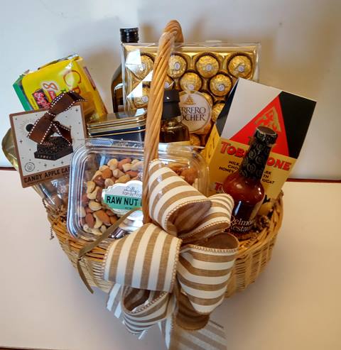 Gourmet food gift basket for corporate events. Chocolates, Olive Oil, Grilling and BBQ Sauce, gourmet tea.