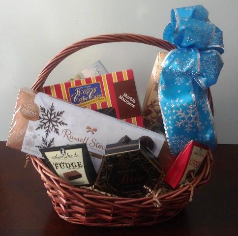 A food gift basket, with coffee cake, chocolate, and nuts, is ideal for corporate and Christmas gifts for delivery in Boston.