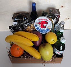 Sparkling water, cream cheese, ripe bananas, nuts, and gourmet snacks