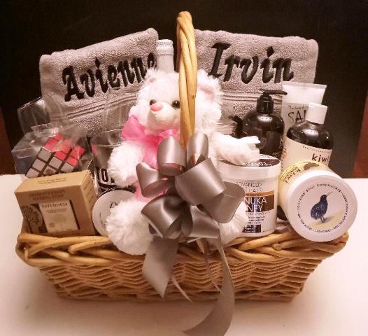 Gift basket containing bath and body essentials in Boston, including personalized towels for corporate gifting on any occasion. 