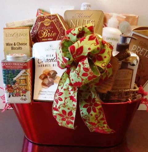 A Christmas gift basket in South Boston, and Newbury St., packed with hot cocoa mix and a variety of gourmet snacks for delivery