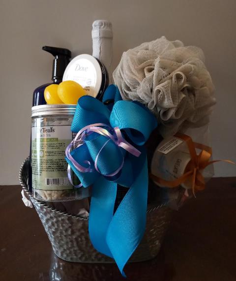  Spa gift basket packed with spa tea, luxury body products in a beautiful silver container for any giving occasion