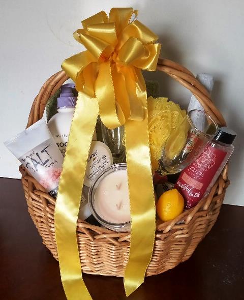 Spa Easter gift basket, containing spa bath and body gift items. Lotion, bath salt, body wash, candle, and bath essential are packed in thei spa basket for delivery in Boston MA
