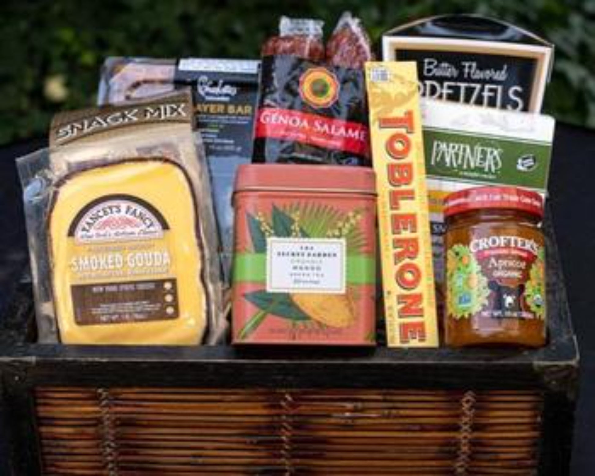 Gourmet Food Gift Basket For Men packed with: Age Cheese, Crackers, Salami, gourmet tea, pretzel and snack mix 