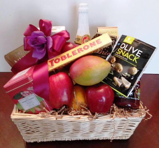 fruit and olive snack sympathy gift basket, tea and chocolate include