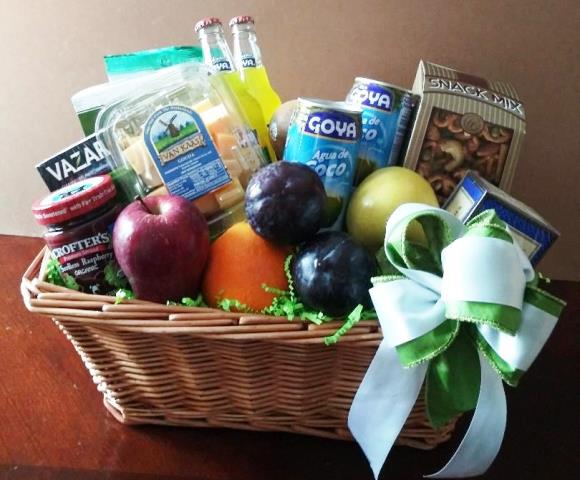 give the food gift basket that male and female will appreciate, include an assortment of refreshing beverages, box of snack mix, an assortment of fruits, crackers, fruit preserves, and dried fruits