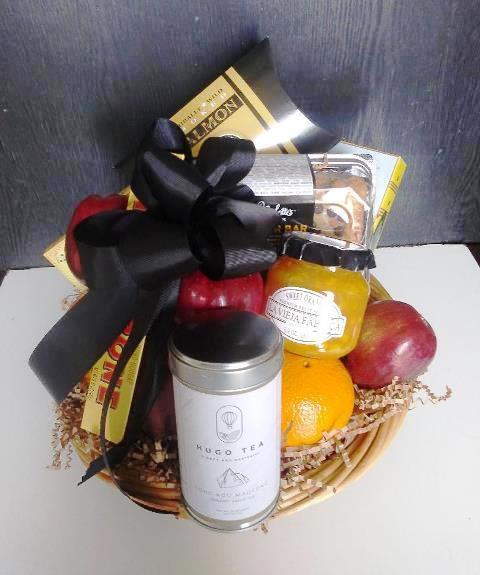A sympathy basket filled with snacks and fresh fruit. Includes crackers, cheese, and dried meat. Delivered to Boston and surrounding area within 20 miles radus.