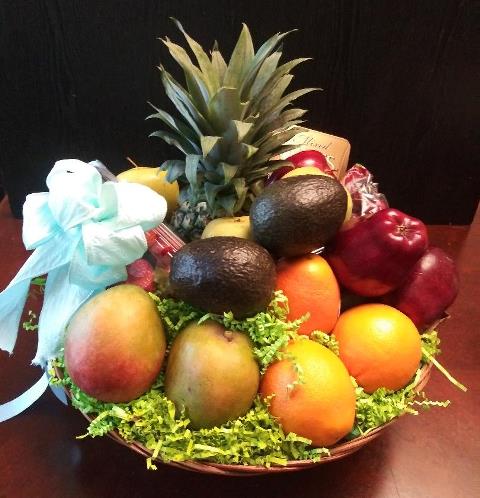 A gift basket packed with fresh Fruit to congratulate New Mom. This fruit gift basket is packed with 2 ready to eat avocado-ripe juicy mangoes-a container of strawberry-oranges-pineapple-apples and nuts