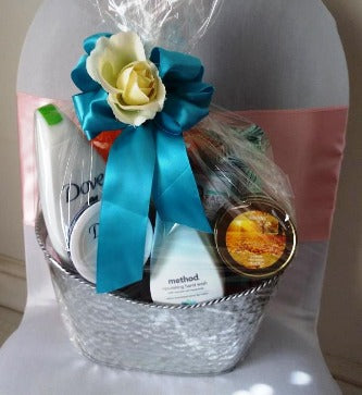 A gift basket filled with spa gift items for delivery in the Back Bay area of Boston, MA., for any special occasion with bath and body care items.