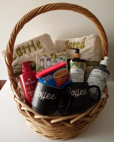 Coffee mugs, personalized bath towels, body wash, and body lotion filled this spa gift basket. Basket for downtown Boston delivery.