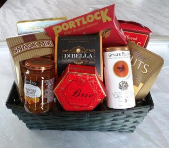 Smoked salmon, snack mix, nuts, tea, and pretzels gift basket